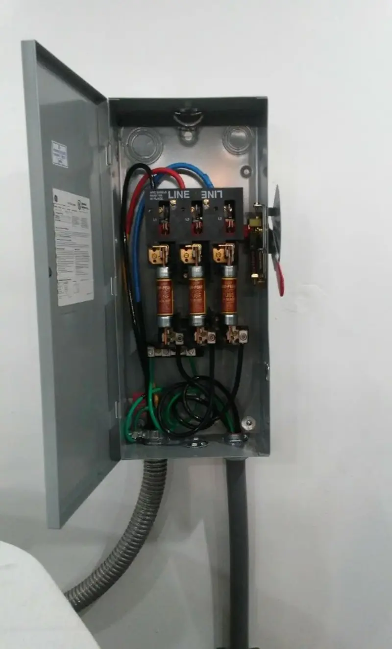 Three-phase disconnect switch installed for Smoke Detector Installation in Cross Mountain